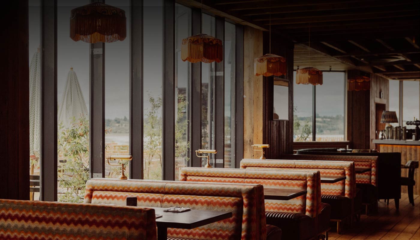 Diner style booths to enjoy food at Bonnies
